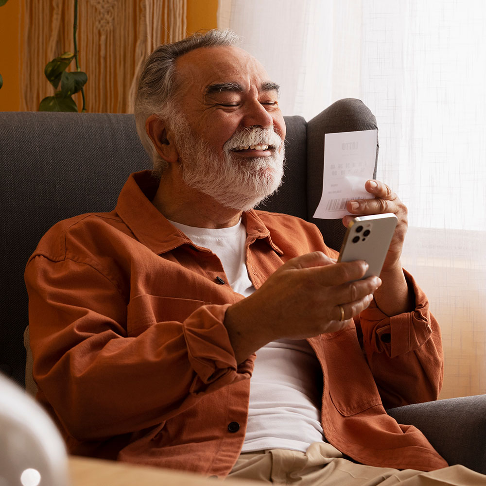 Senior patient using phone to schedule mobile woundcare with Atrium Woundcare